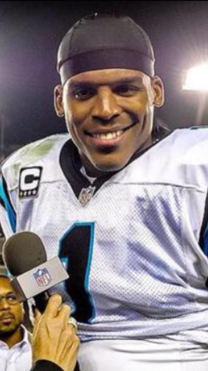 cam-newton-smile-575x1024.jpg