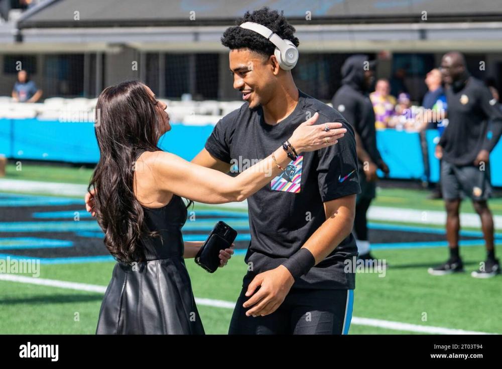 nicole-tepper-talks-with-carolina-panthers-quarterback-bryce-young-9-before-an-nfl-football-game-against-the-minnesota-vikings-sunday-oct-1-2023-in-charlotte-nc-ap-photojacob-kupferman-2T03T94.jpg